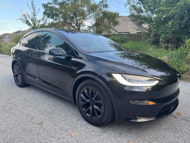 Used 2022 Solid Black Tesla Base image 4