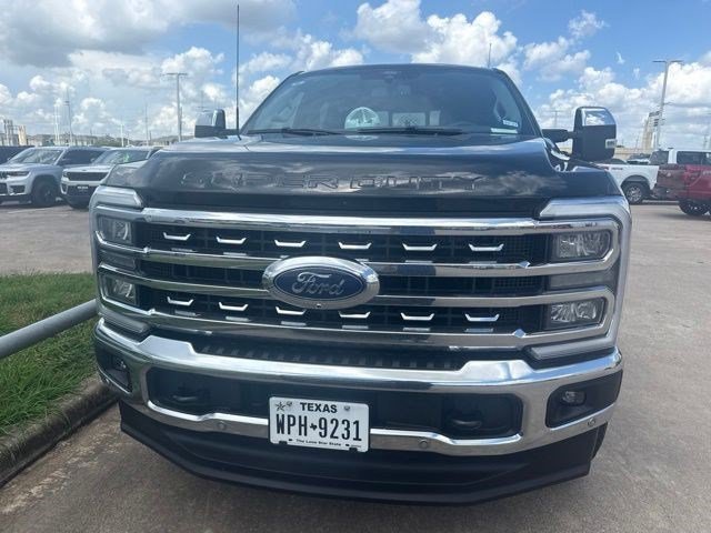 Used 2025 Agate Black Metallic Ford Lariat image 2