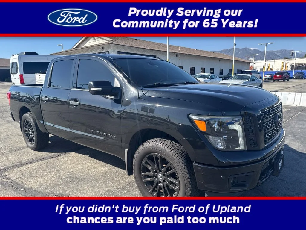 Used 2019 Magnetic Black Nissan SV image 1