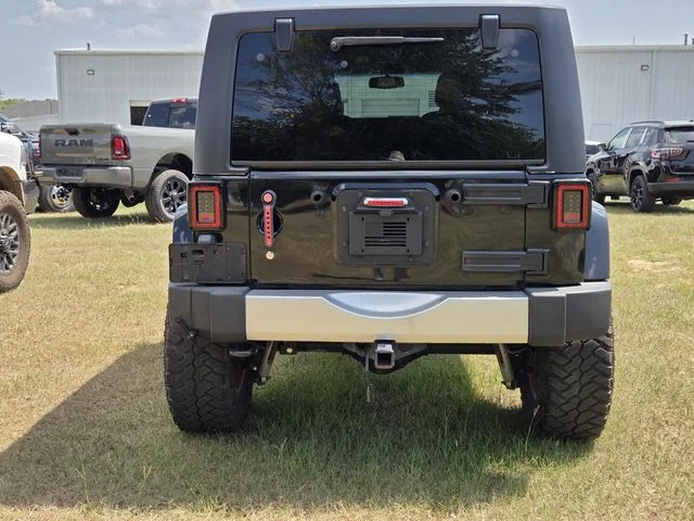 Used 2014 Black Jeep Unlimited Sahara image 8
