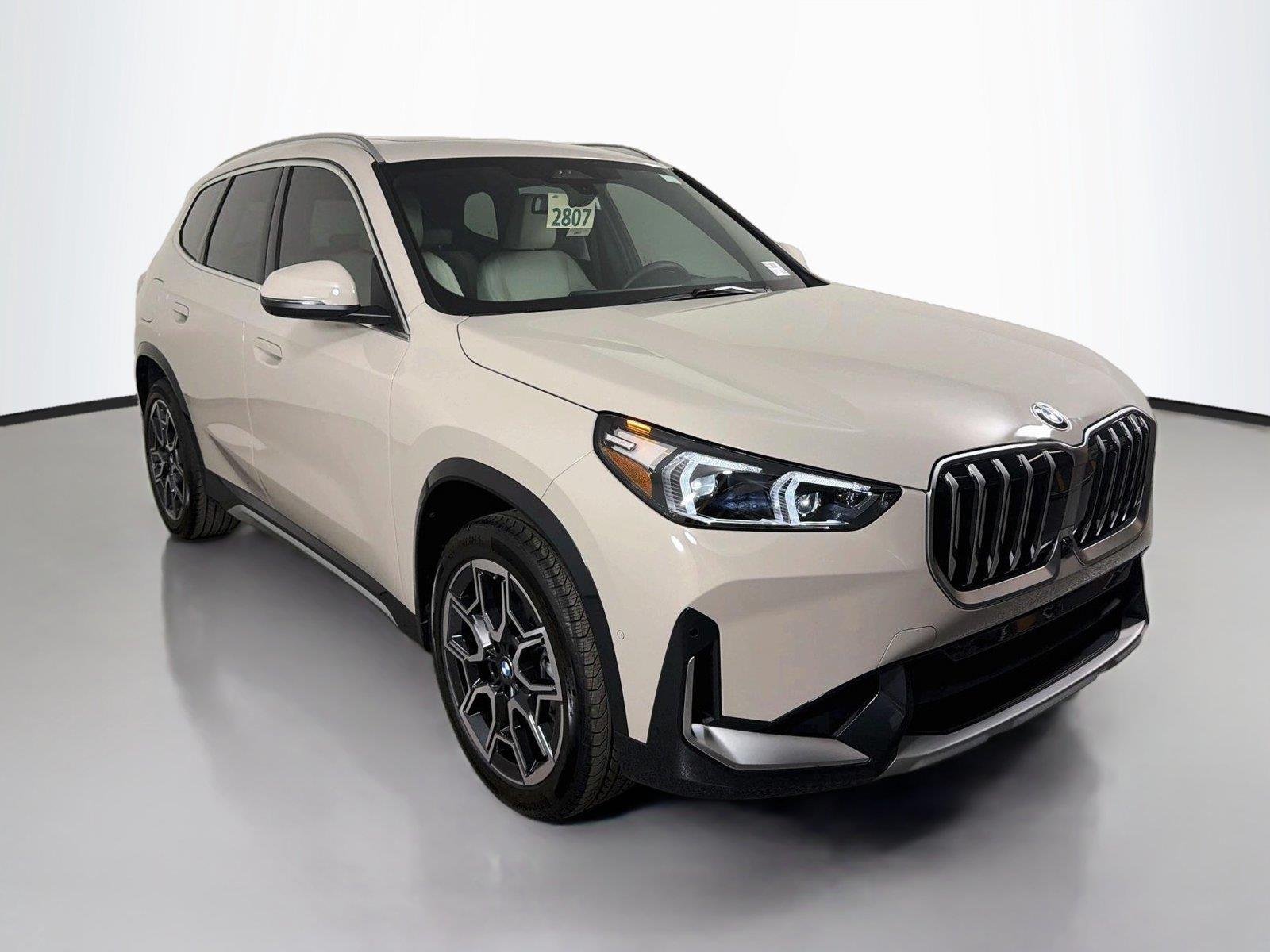 New 2026 Dune Grey Metallic BMW xDrive28i image 3