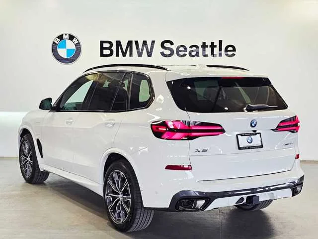 Used 2025 Alpine White BMW xDrive50e image 4