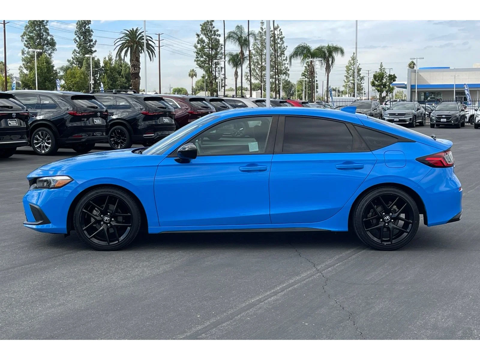 Used 2024 Boost Blue Pearl Honda Sport image 2