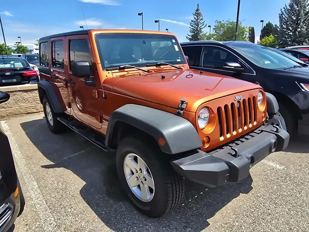 Used 2011 Mango Tango Pearlcoat Jeep Sport image 7