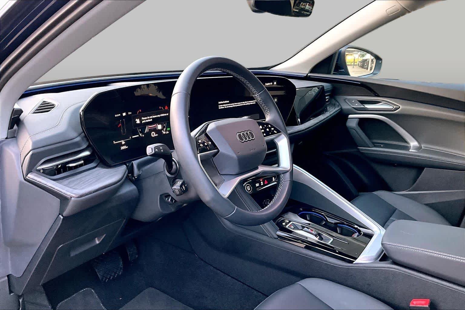 Used 2025 Navarra Blue Metallic Audi Premium image 17