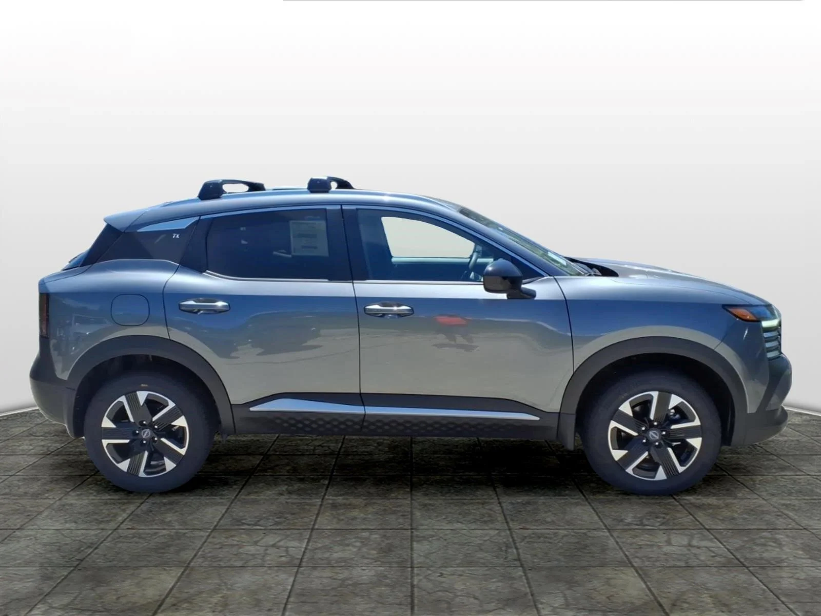 New 2026 Gun Metallic Nissan SV image 2