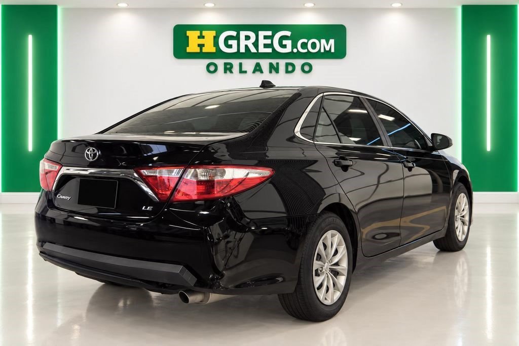 Used 2016 Midnight Black Metallic Toyota LE image 4