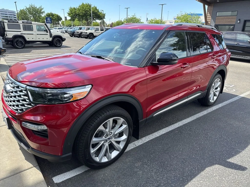 Used 2023 Red Metallic Ford Platinum image 1