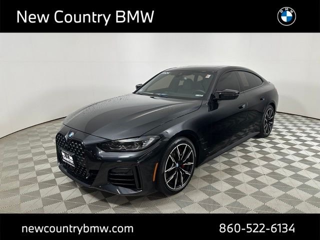 Used 2024 Black Sapphire Metallic BMW M440i xDrive image 3
