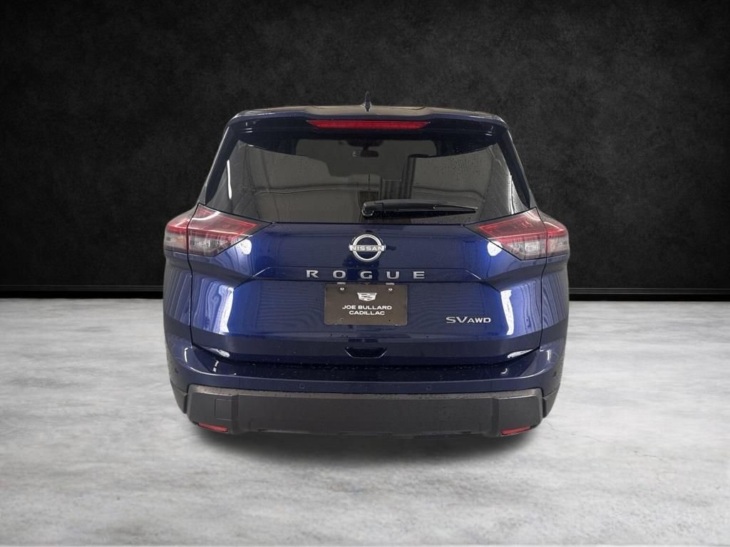 Used 2024 Deep Ocean Blue Pearl Nissan SV image 6