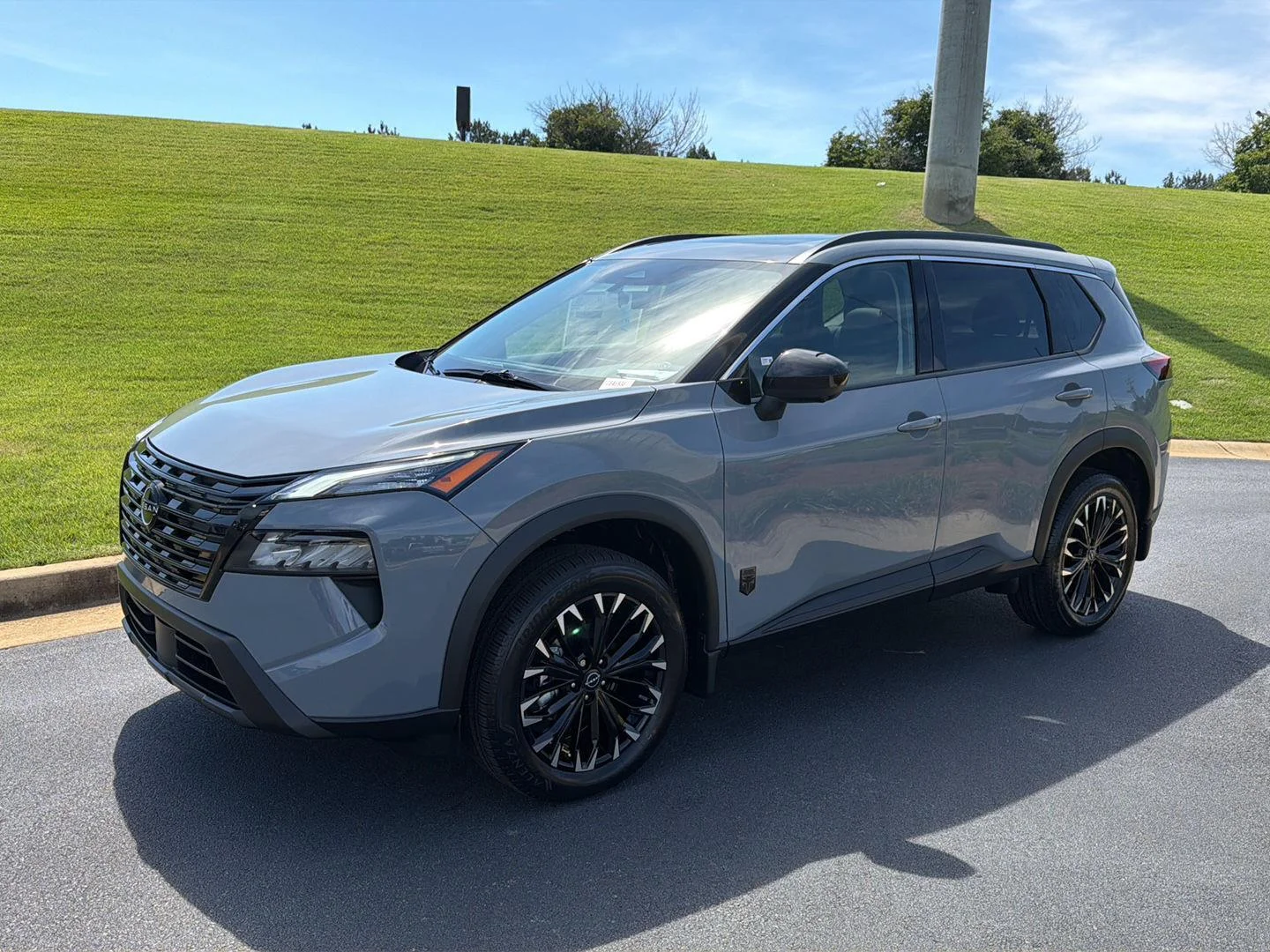 New 2026 Boulder Gray Pearl Nissan Dark Armor image 2