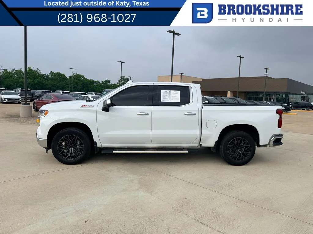 Used 2023 Summit White Chevrolet LTZ image 1
