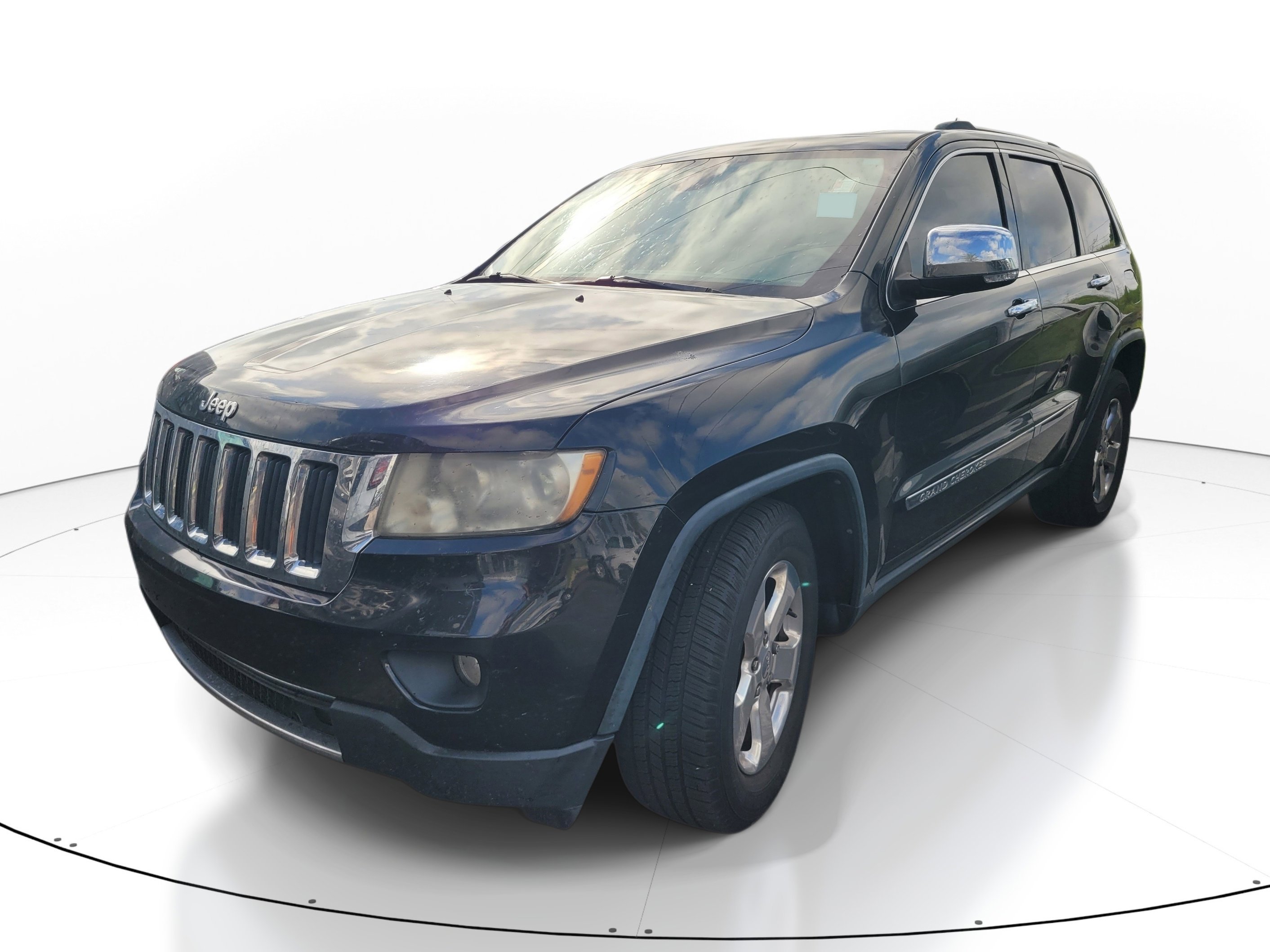 Used 2013 Brilliant Black Crystal Pearl Jeep Limited image 2