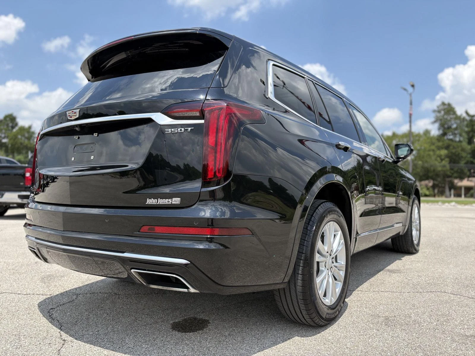 Used 2024 Stellar Black Metallic Cadillac AWD Luxury image 24