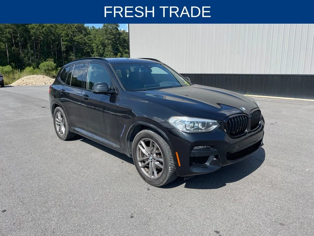 Used 2021 Black BMW xDrive30i image 1