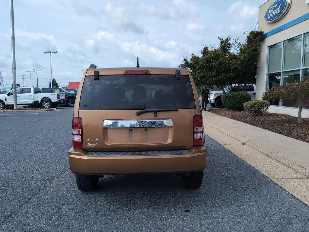 Used 2011 Brown Jeep Sport image 6