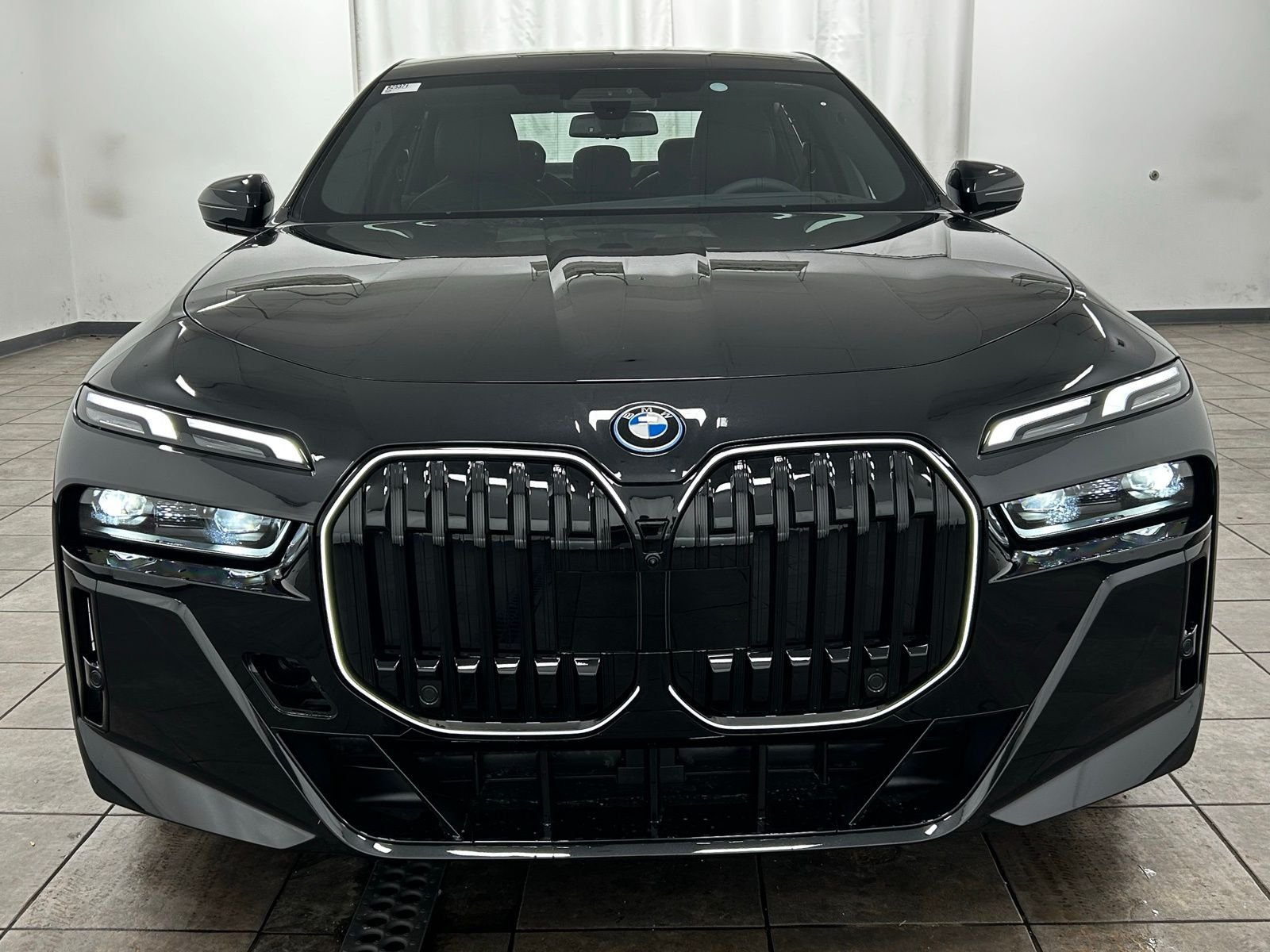 New 2026 Black Sapphire Metallic BMW xDrive60 image 11