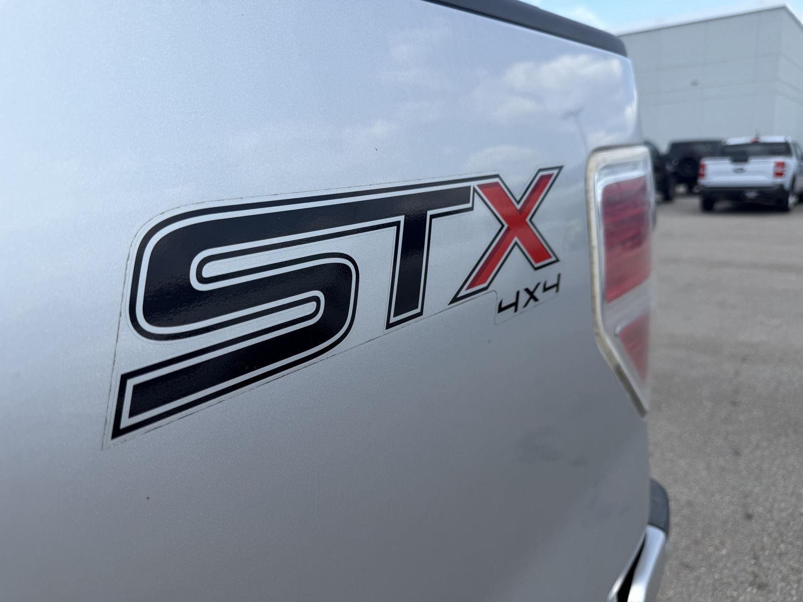 Used 2014 Ingot Silver Metallic Ford STX image 22