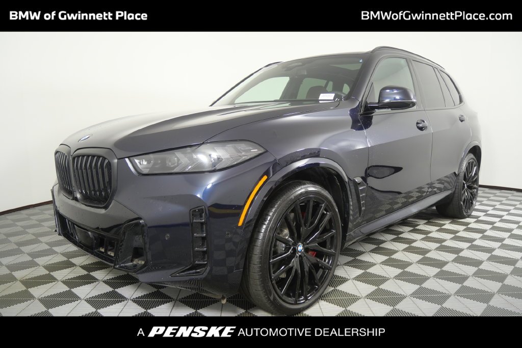 Certified Used 2026 Carbon Black Metallic BMW xDrive40i image 1