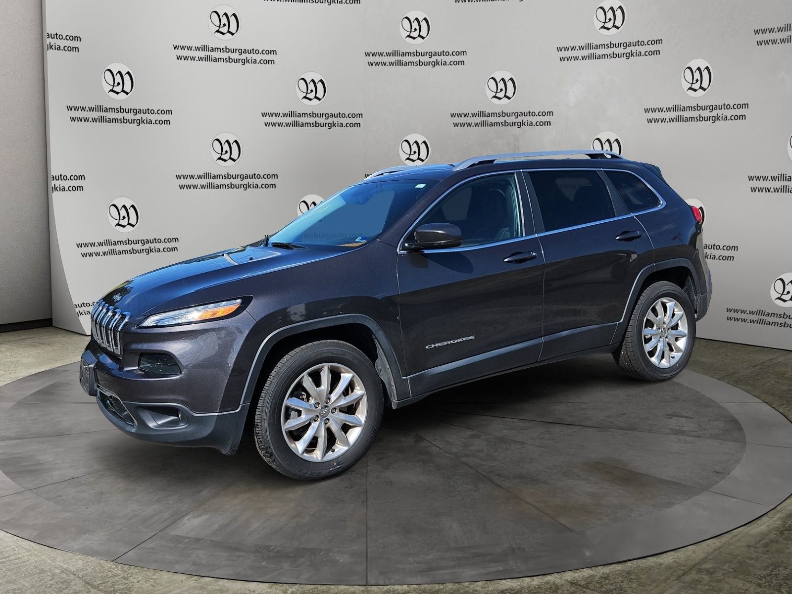 Used 2015 Gray Jeep Limited image 1