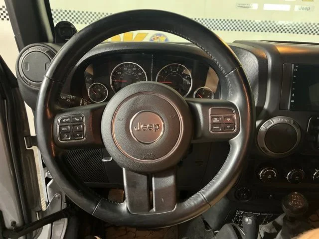 Used 2014 Billet Metallic Clearcoat Jeep Unlimited Sport image 12