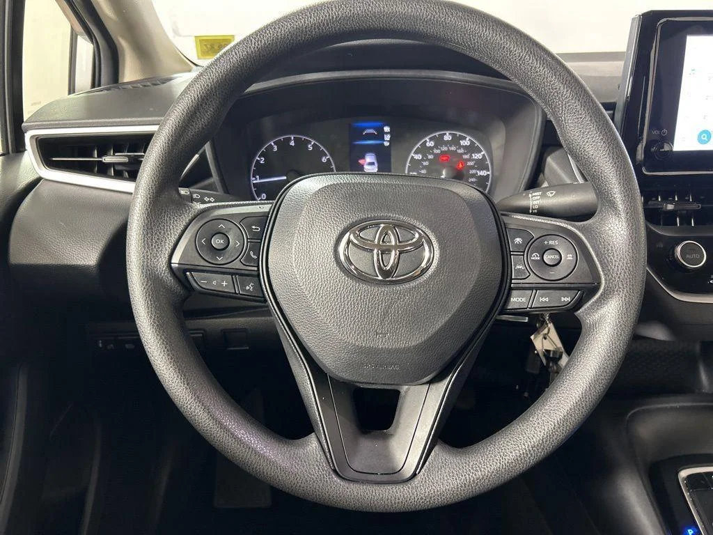 Used 2023 Classic Silver Metallic Toyota LE image 23