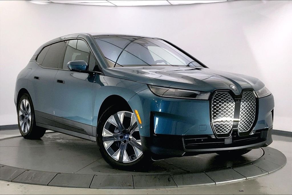 Used 2024 Blue BMW xDrive50 image 1