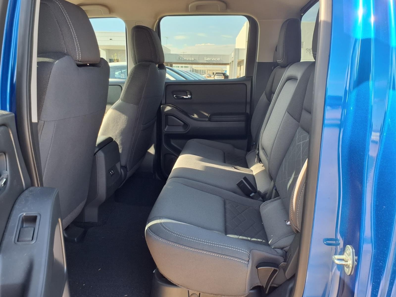 2026 Nissan Frontier SV Blue at Robbins Nissan