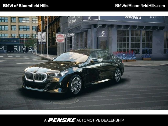 Used 2026 Black Sapphire Metallic BMW 550e xDrive image 1