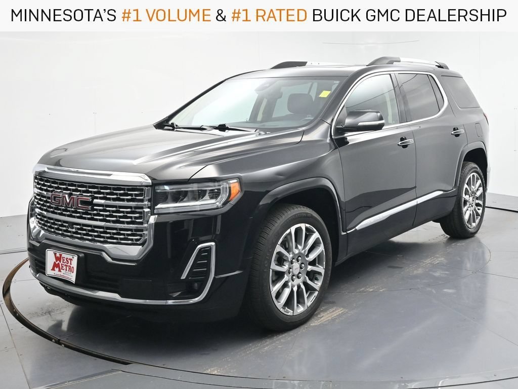 Used 2022 Ebony Twilight Metallic GMC Denali image 1