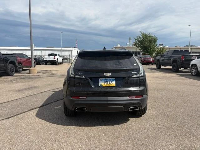 Used 2019 STELLAR BLACK METALLIC Cadillac AWD Sport image 6