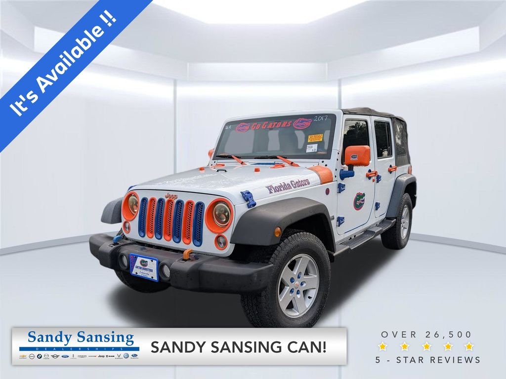 Used 2017 White Jeep Unlimited Sport image 1