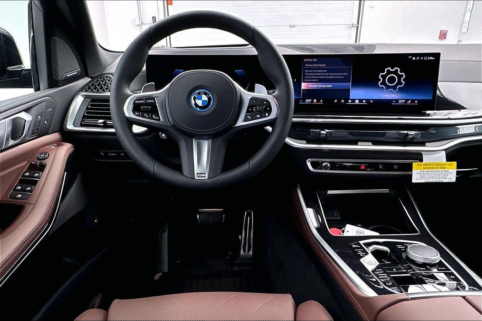 New 2026 Black Sapphire Metallic BMW xDrive50e image 10