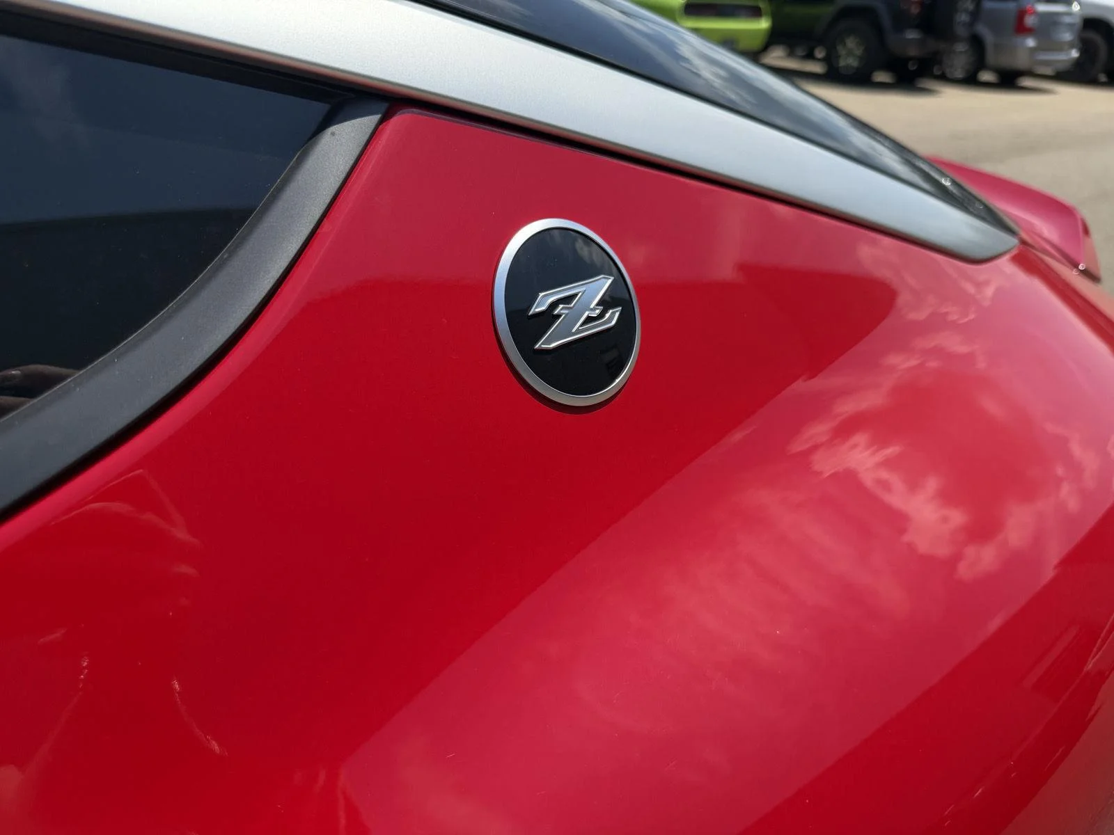 Used 2025 Solid Red/Super Black Nissan Performance image 22