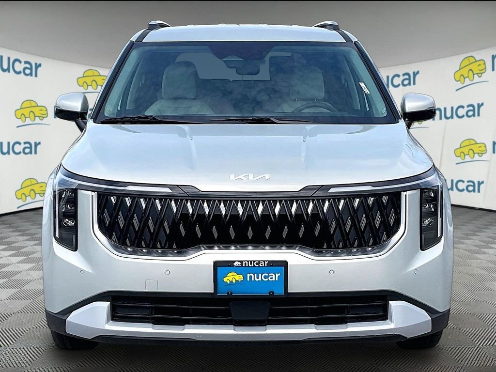 New 2026 Ivory Silver Kia EX image 3