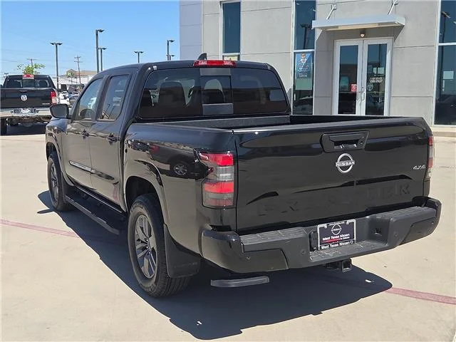 Used 2026 Super Black Nissan SV 4x4 Crew Cab 5 ft. box 126 in. WB image 2