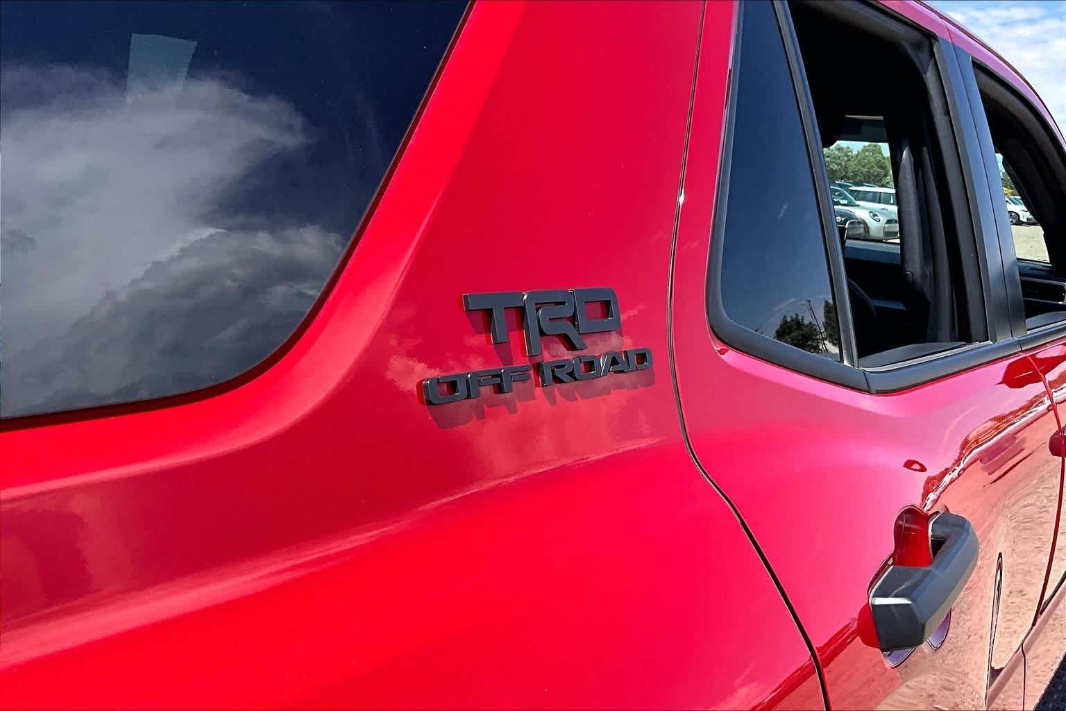 Used 2025 Supersonic Red Toyota Hybrid TRD Off Road Premium image 8