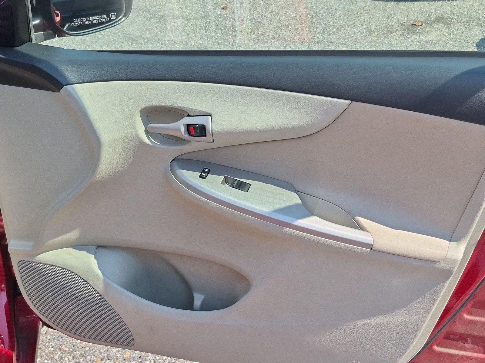 Used 2011 Barcelona Red Metallic Toyota LE image 30