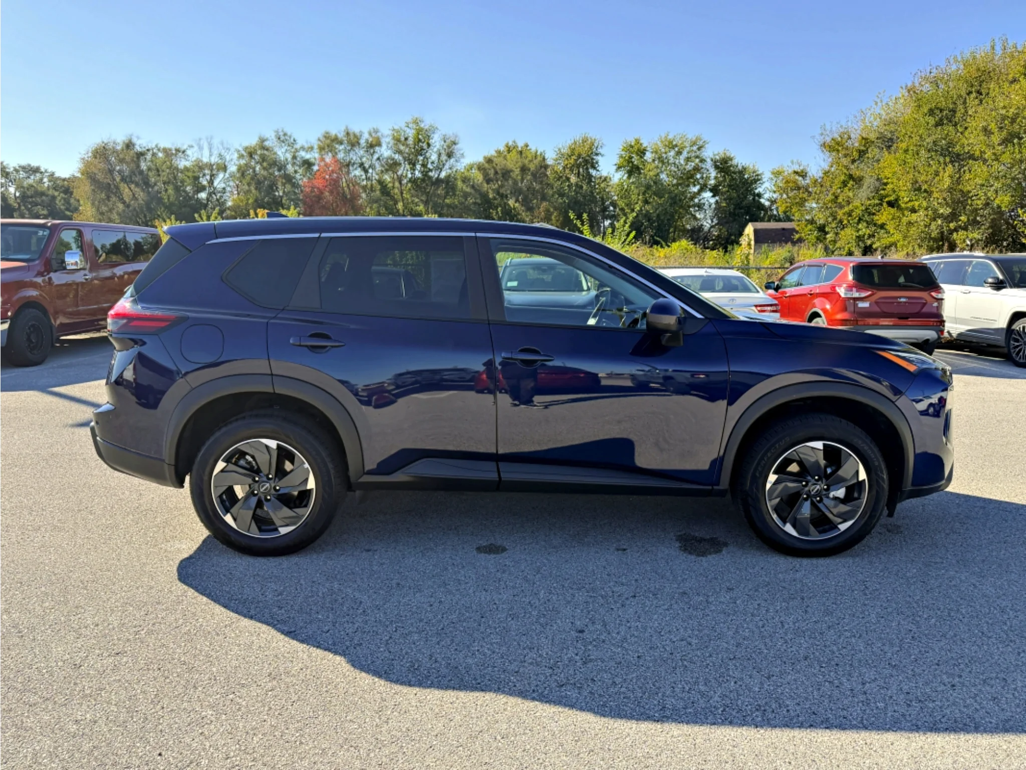 Used 2026 Deep Ocean Blue Pearl Nissan SV image 24