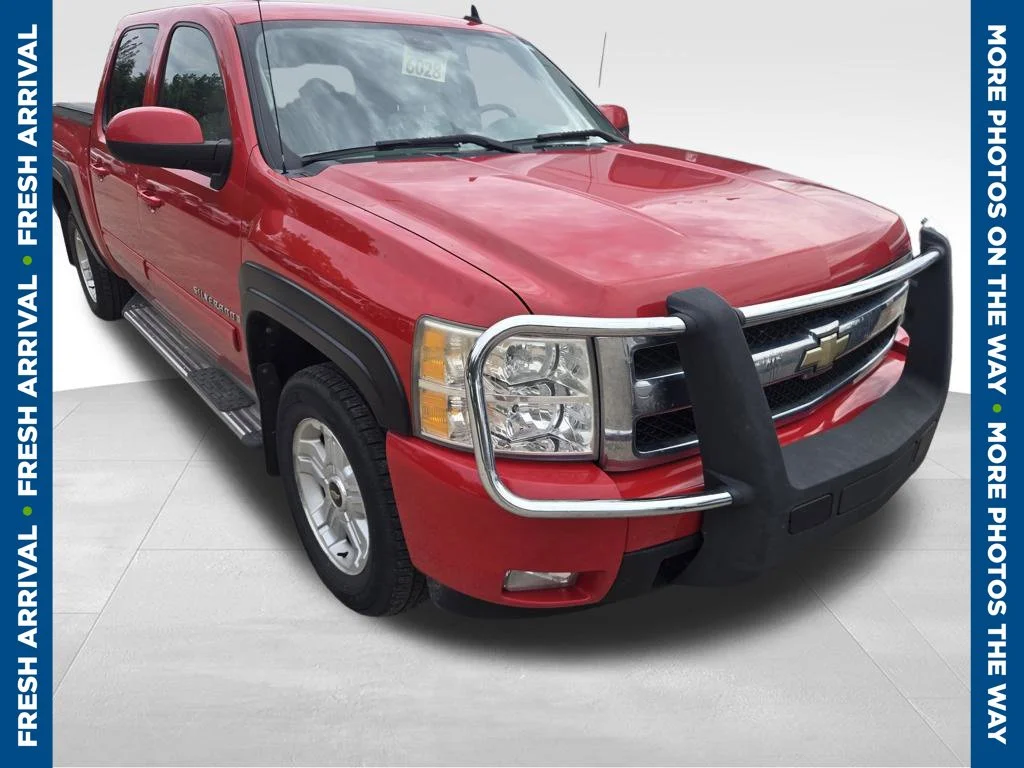 Used 2009 Red Chevrolet LTZ image 1