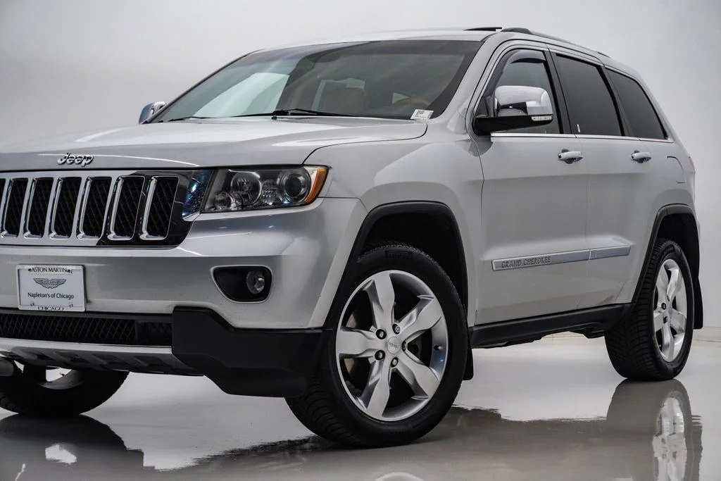Used 2011 Bright Silver Metallic Jeep Overland image 2
