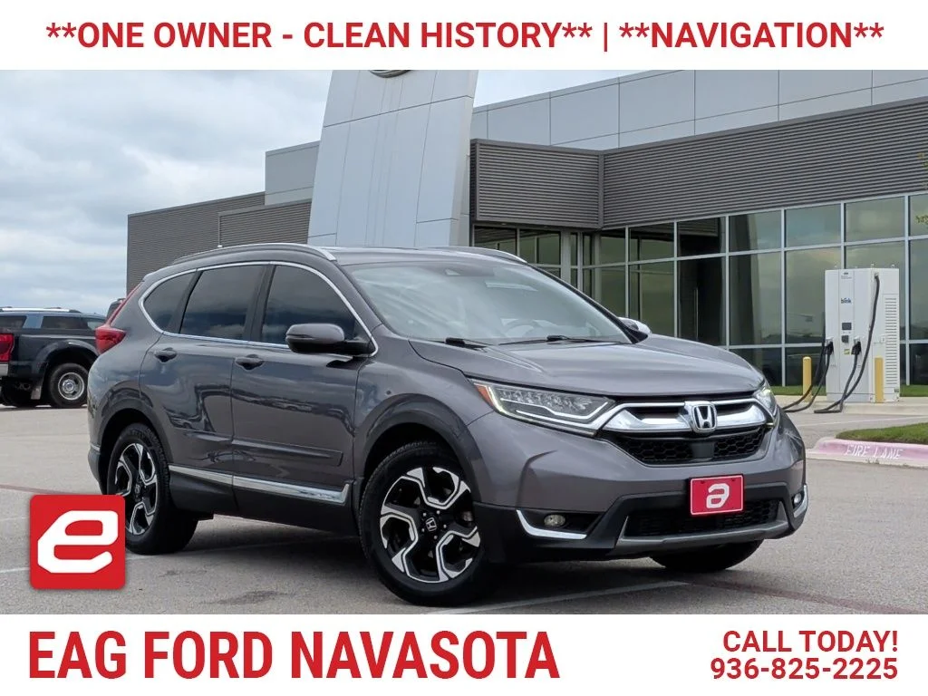 Used 2018 Lunar Silver Metallic Honda Touring image 1