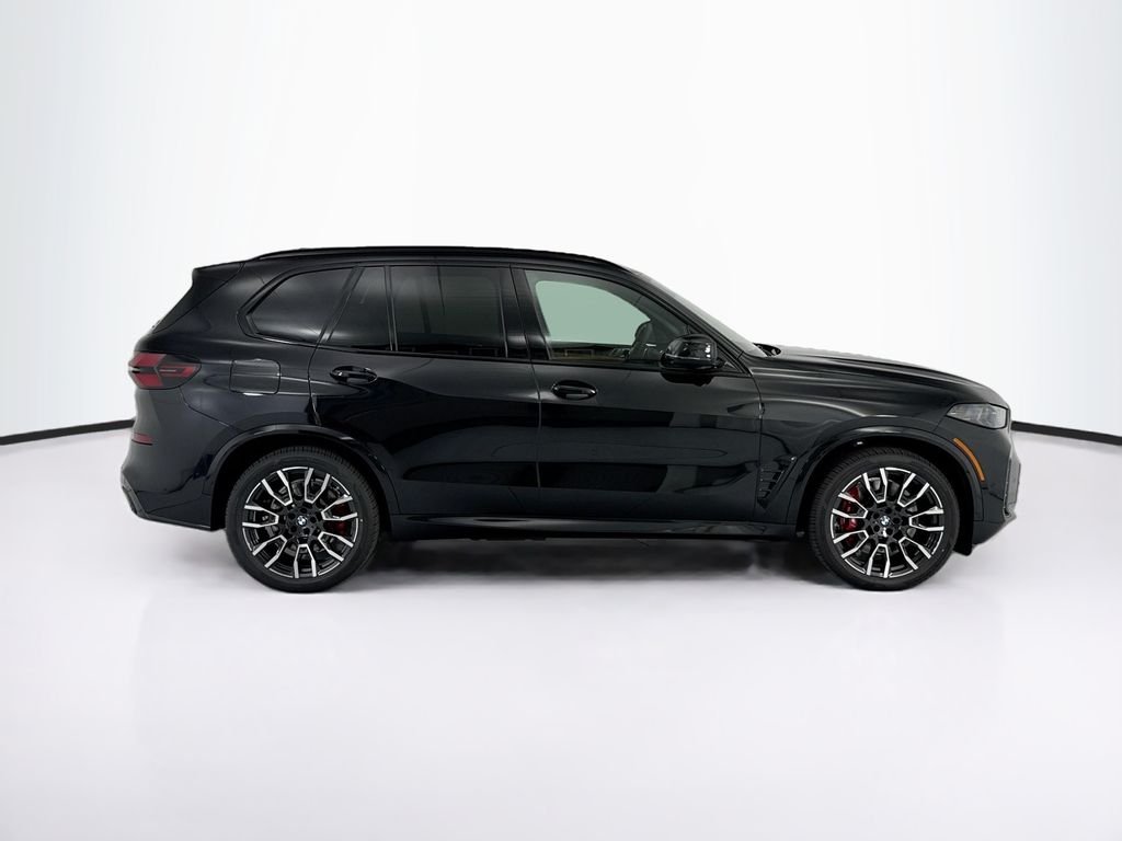 New 2026 Black Sapphire Metallic BMW xDrive50e image 4