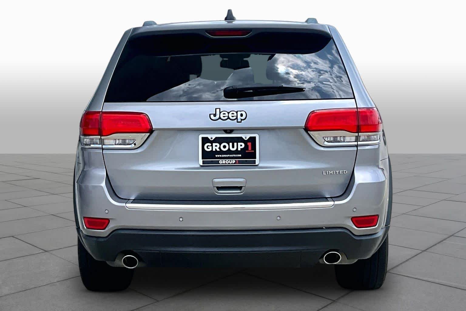 Used 2014 Billet Silver Metallic Clearcoat Jeep Limited image 4