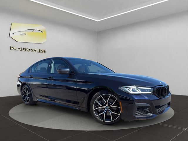 Used 2023 Carbon Black Metallic BMW 530i xDrive image 1