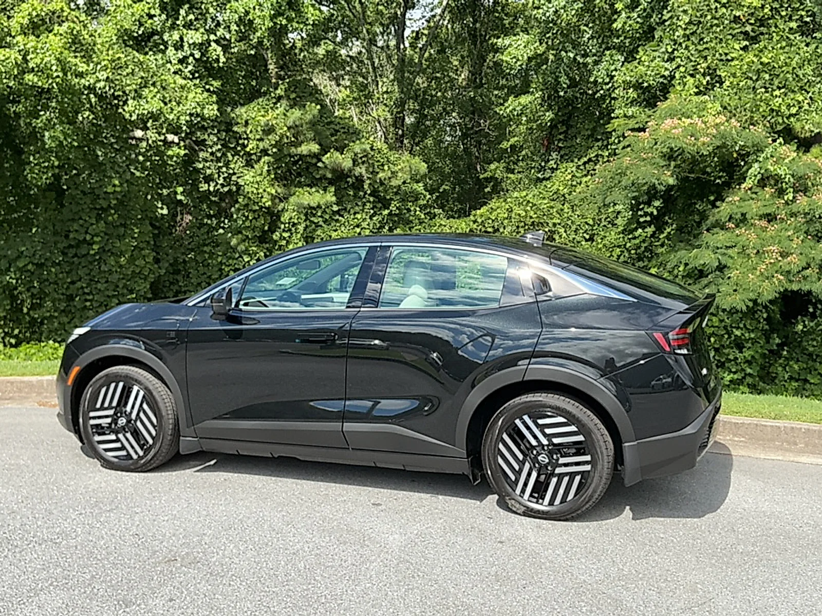 New 2026 Black Diamond Pearl Nissan SV+ image 3