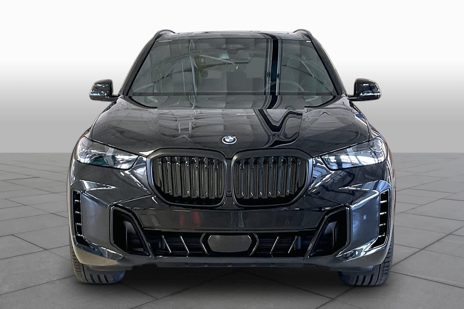 New 2026 Black Sapphire Metallic BMW xDrive50e image 3