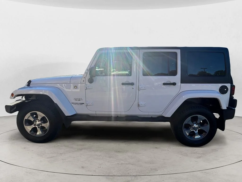 Used 2018 Bright White Jeep Unlimited Sahara 4x4 image 2