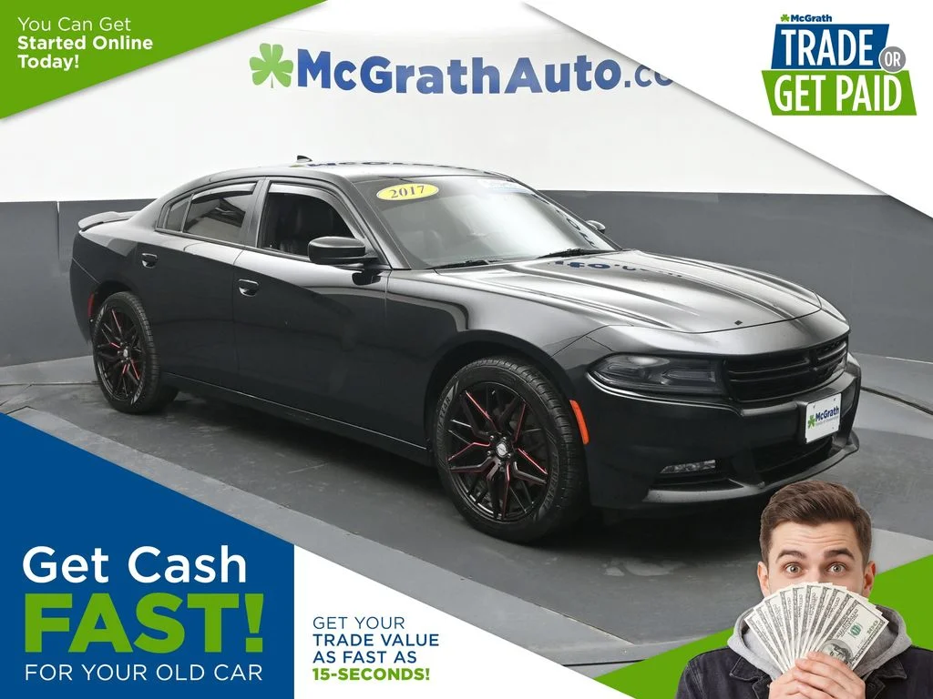 Used 2017 Black Dodge SXT image 1