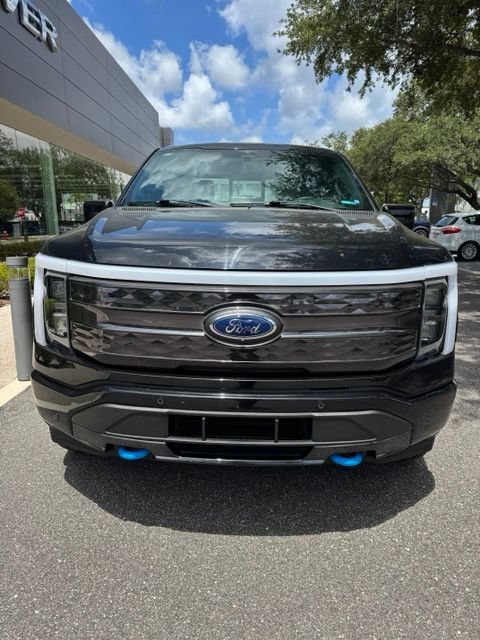 Used 2023 Ford F-150 Lightning Platinum with VIN 1FT6W1EV9PWG27693 for sale in Tampa, FL